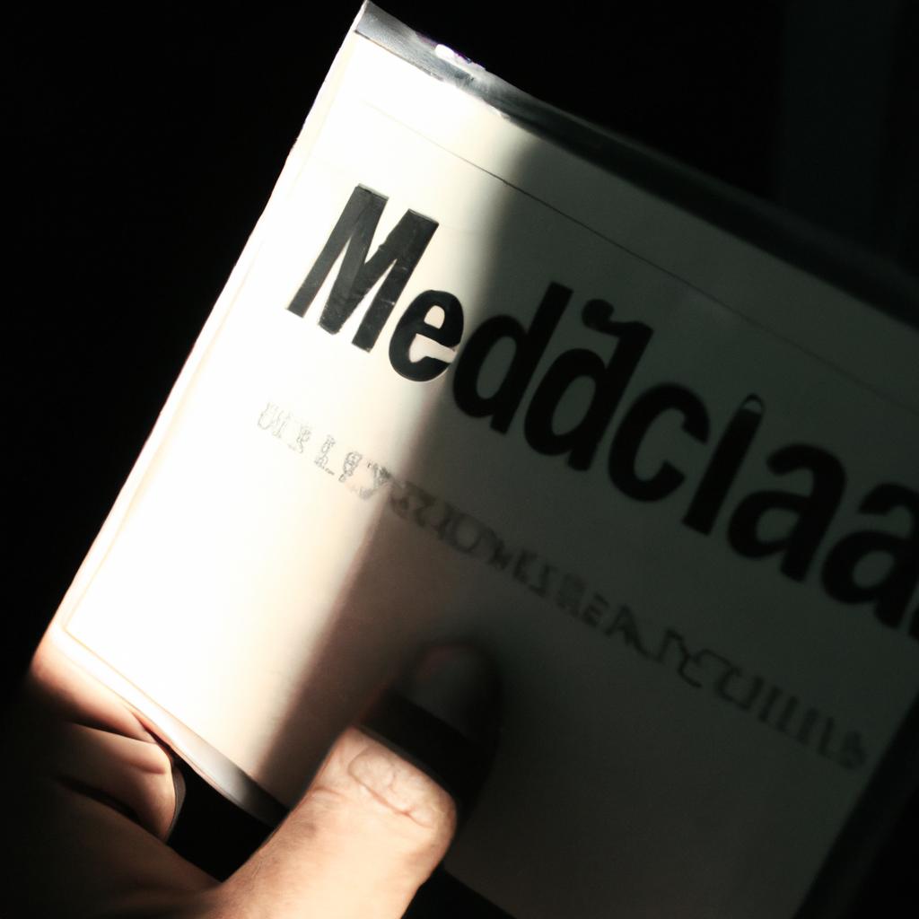 Person holding a medical pamphlet