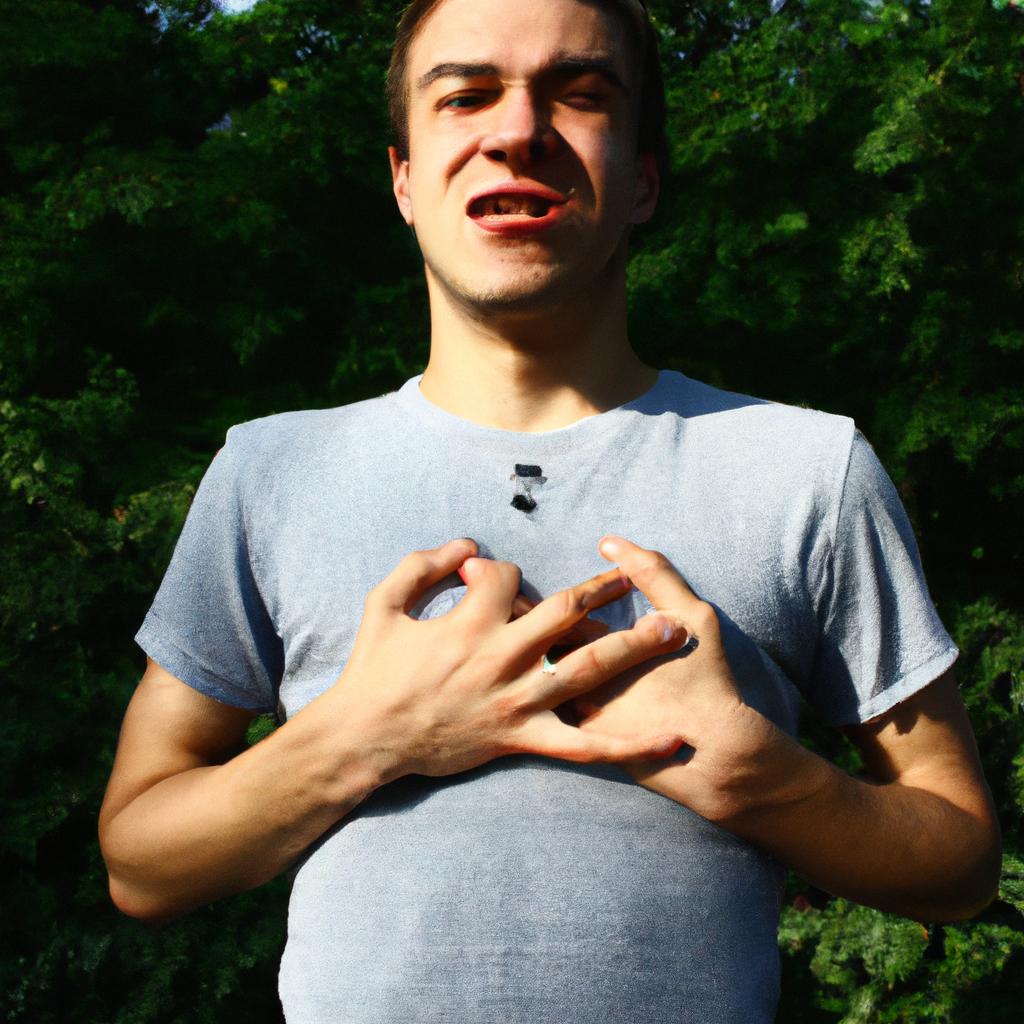 Person holding their chest, grimacing